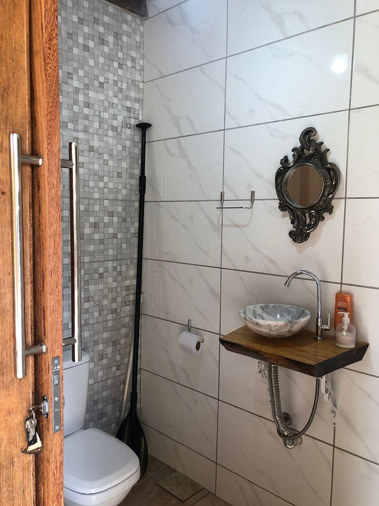 Casa Sol e Mar próxima da praia, com ar