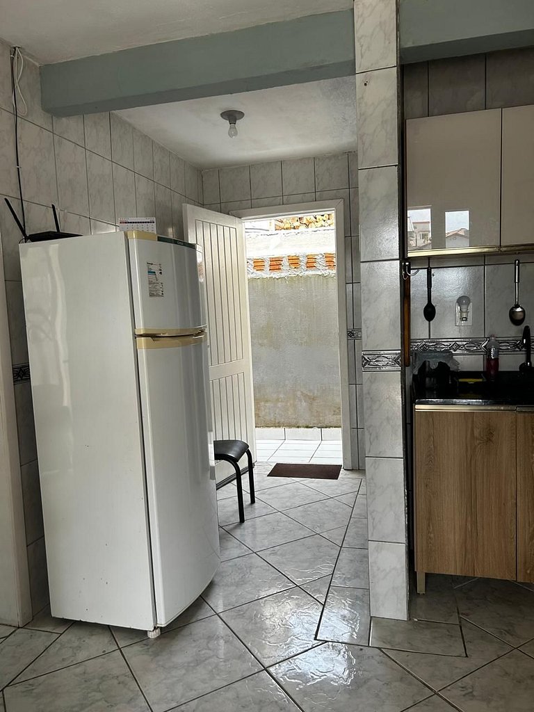 Casa a 250 metros da praia com varanda e sinuca