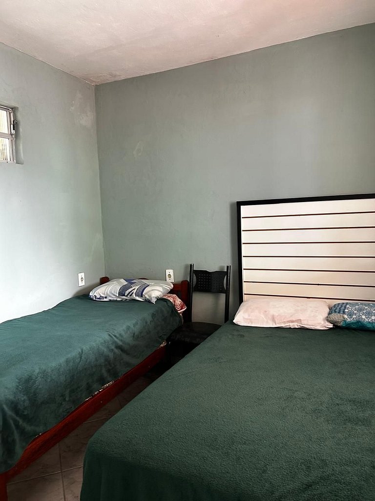 Casa a 250 metros da praia com varanda e sinuca