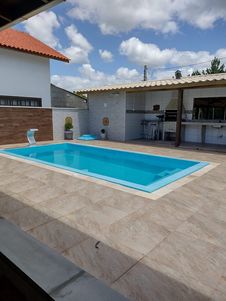 Casa Mar Azul com piscina.