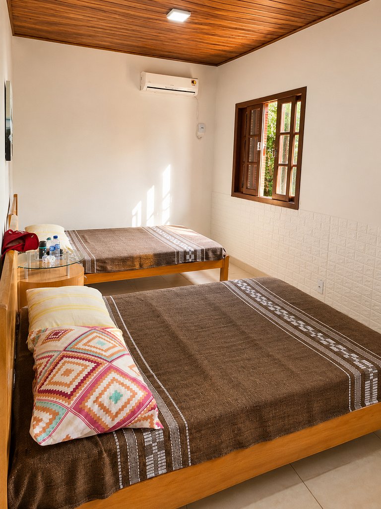 Casa Sol e Mar próxima da praia, com ar