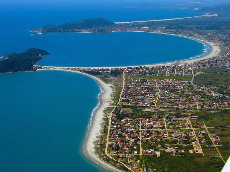 Casa Sol e Mar próxima da praia, com ar