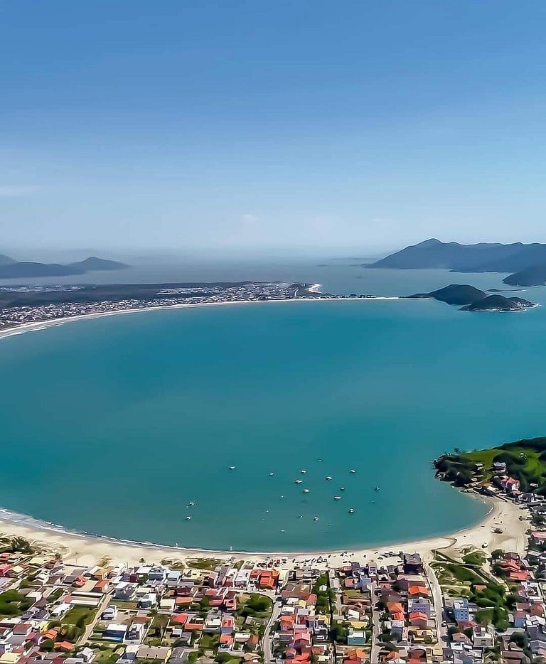 Casa Sol e Mar próxima da praia, com ar